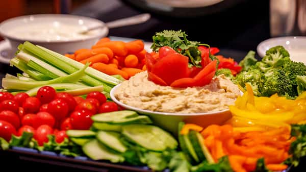 A tray of veggies with hummus dip at Carolina Ale House