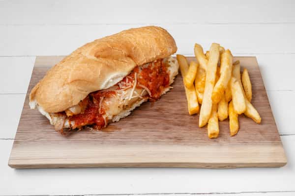 Chicken Parmesan with fries on a wooden tray