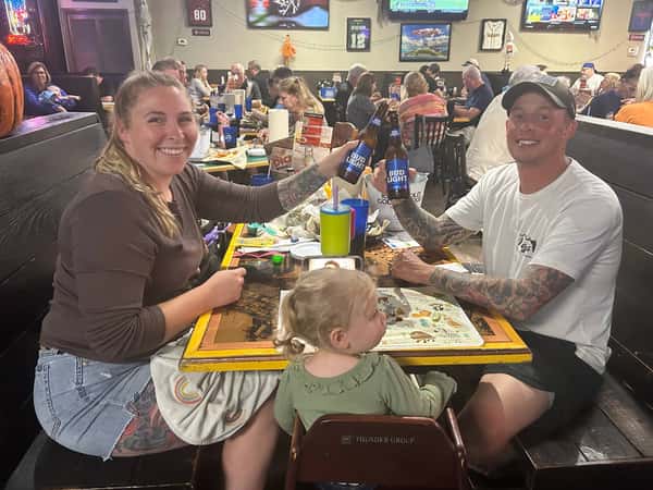 family eating at Dick's Wings