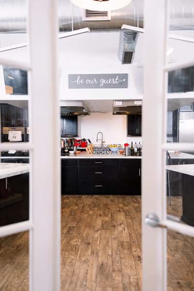 French doors opening in the cooking classes space