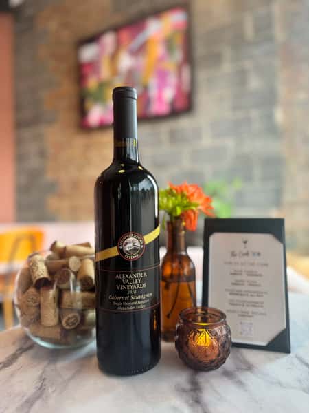 Decorated wine bottle on table