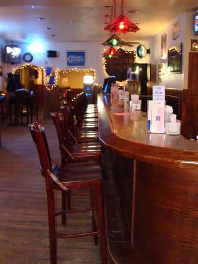 Bar stools next to bar