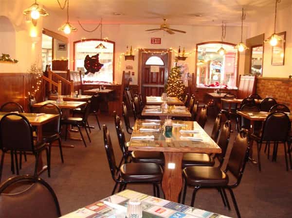 Dining area with Christmas tree in the background