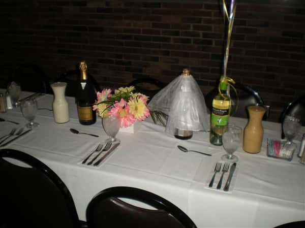 Groom and bride themed table decor for a wedding