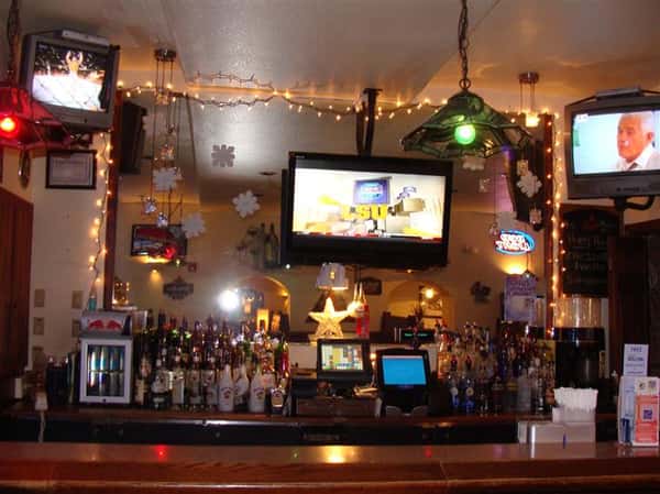 Bar area of establishment with Tv in the background