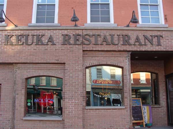Front entrance of restaurant with sign
