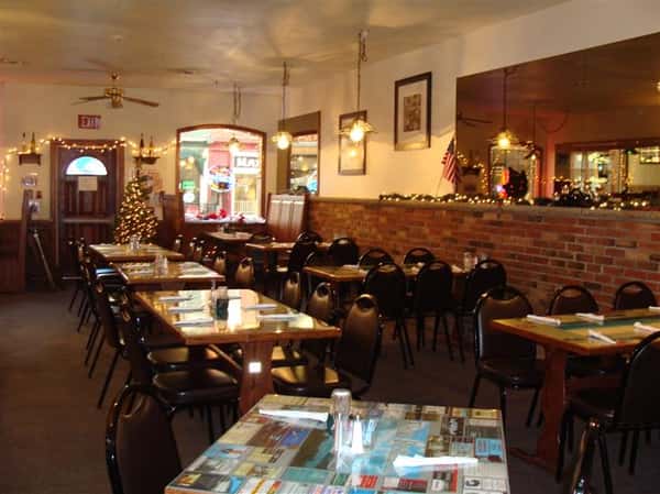 Dining area with Christmas tree in the background