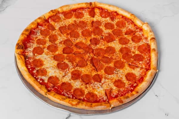 New York style pepperoni pizza with melted mozzarella and crispy crust, sliced into even pieces