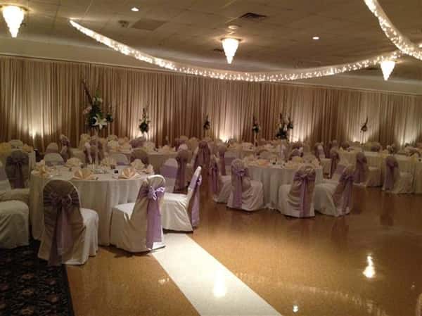 Catering dance hall with multiple tables and chairs