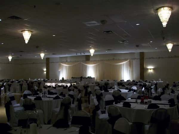 Tables set up for an event with lights