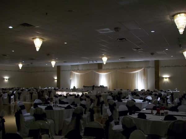 Tables set up for an event with lights
