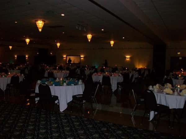 Catering hall setup with multiple chairs and tables