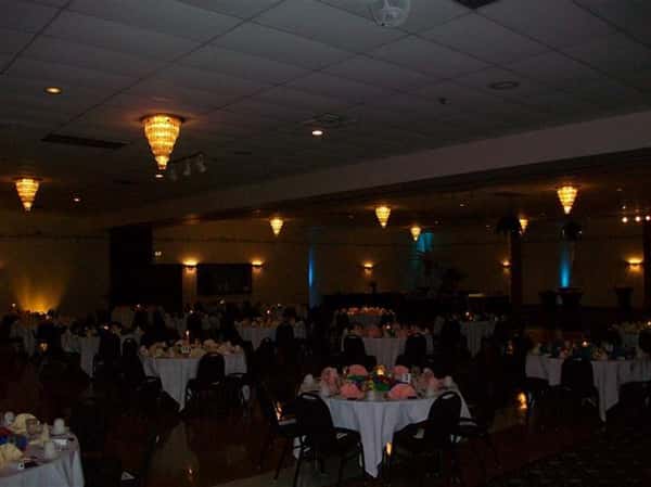 Catering hall setup with multiple chairs and tables