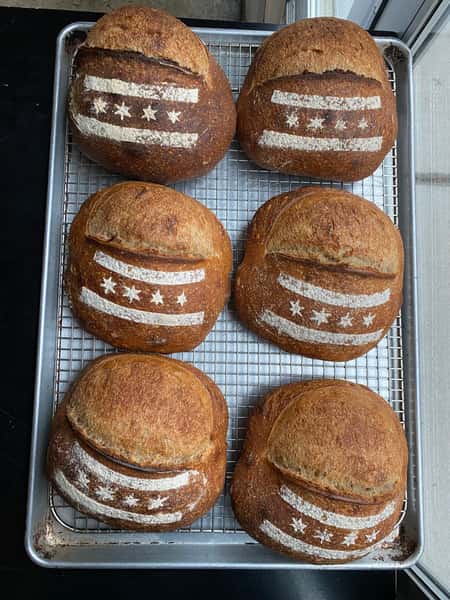 sourdough bread with stencil flour designs