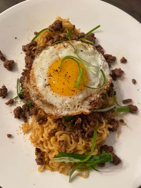 noodle entree with fried egg
