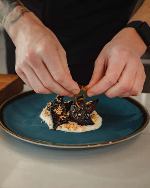 chef preparing plates