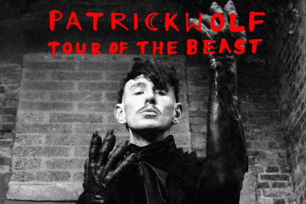 Photo of Patrick Wolf with hands outstretched for his upcoming show at Smith's Olde Bar on June 11th, 2026