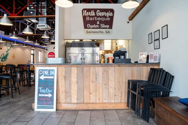 Ordering counter and dining space inside North Georgia BBQ in North Georgia