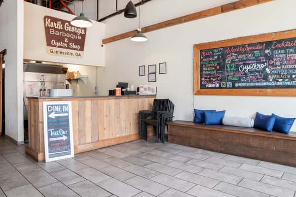North Georgia BBQ ordering counter and dining area with rustic Southern barbecue charm