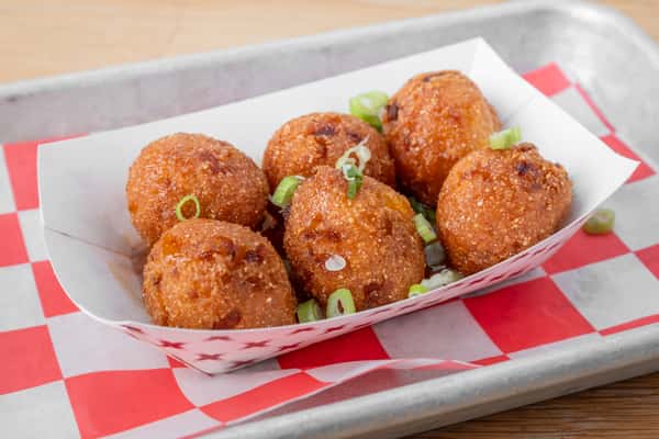 Golden fried corn pups served hot as a Southern appetizer at North Georgia BBQ
