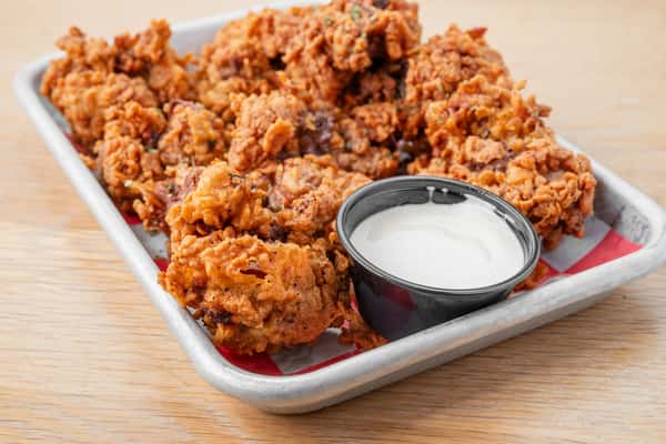 Golden fried chicken livers served with ranch dipping sauce at North Georgia BBQ