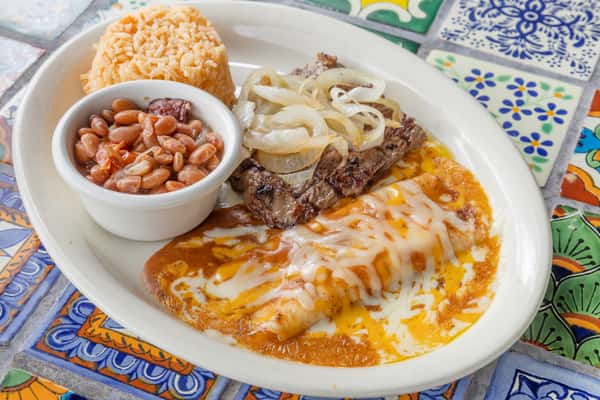 Steak and onion with enchiladas