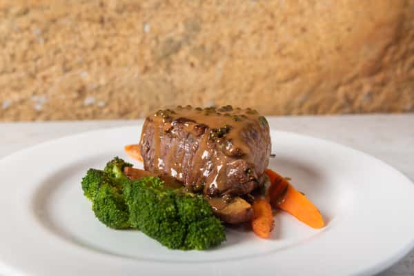 veal dish with carrots and broccoli