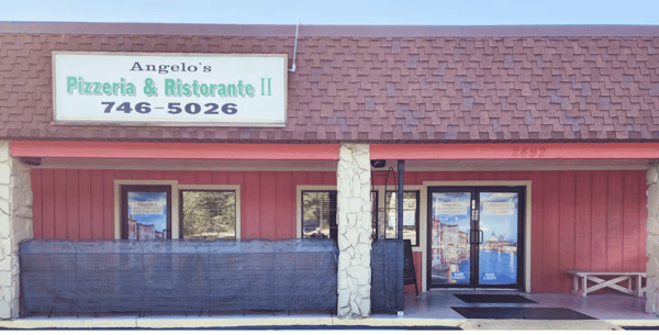 Front entrance of Angelo's Pizzeria & Ristorante II with a red exterior, stone columns, and signage displaying the phone number.
