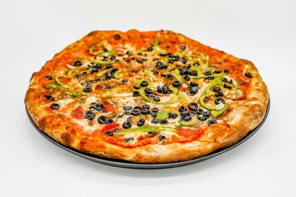 Round pizza topped with black olives, green bell peppers, onions, mushrooms, and melted cheese on a golden-brown crust.