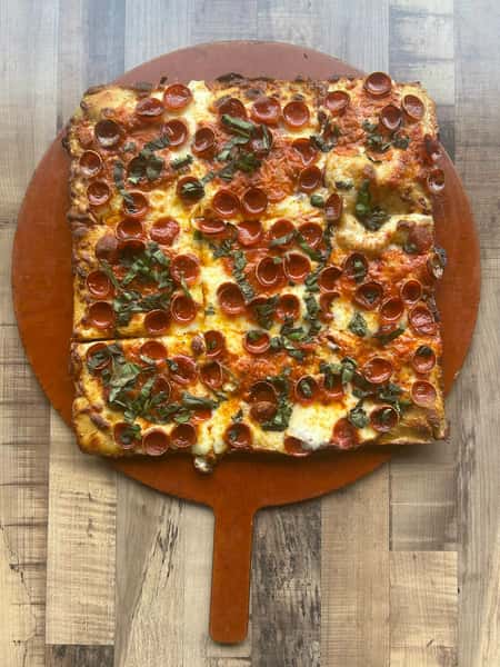 Grandma Pizza with Spicy Vodka sauce, basil and Cup Pepperoni