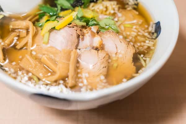 Ramen soup with pork, rice and veggie