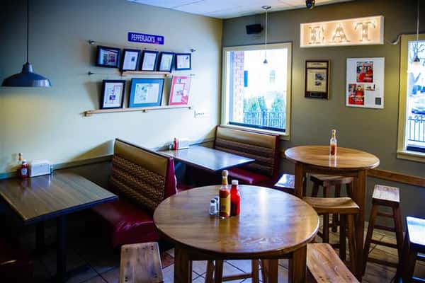Interior shot of the restaurant's round tables