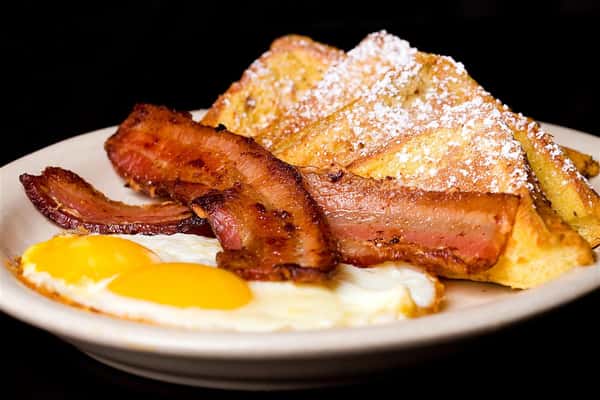 #4 Two *Eggs Any Style, Bacon, Ham, Sausage or Turkey Sausage, and Pancakes or French Toast