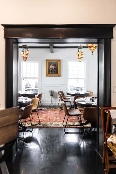 Cozy dining space for private events at The Mayor's House by Selda