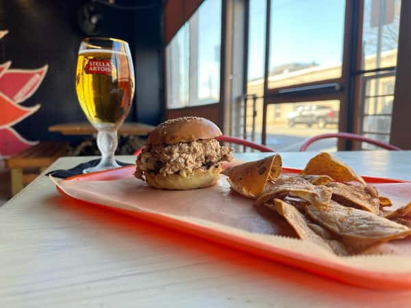 Come try our NEW smoked chicken salad sandwich served on a brioche bun with a side of our house seasoned chips! Also grab a @stellaartoisusa Premium Cider and keep the glass! (While supplies last+one per customer) #alwaystuesday #mexicue #love #yummy #picoftheday #photography