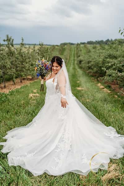Bride in orchard
