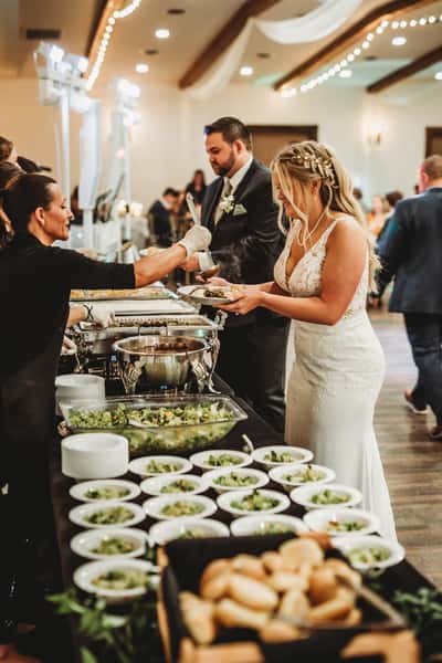 catering with bride and groom