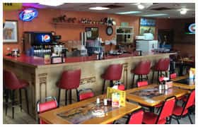 indoor dining area with bar stools