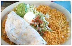 soft taco with a side of rice, sour cream, guacamole, and salsa