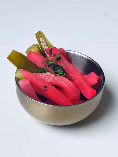 House-pickled turnips and cucumbers served as a traditional Lebanese side at Lira House in Wynwood, Miami.