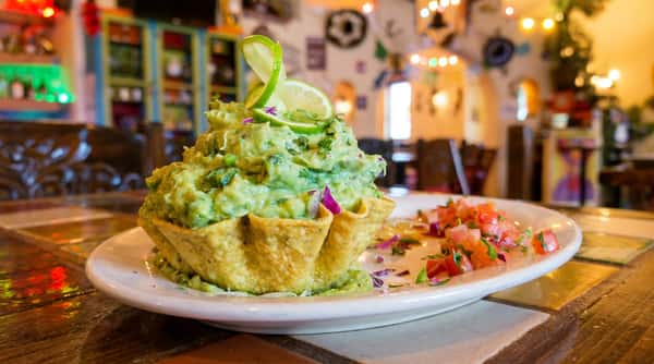 Guacamole in a fried taco shell