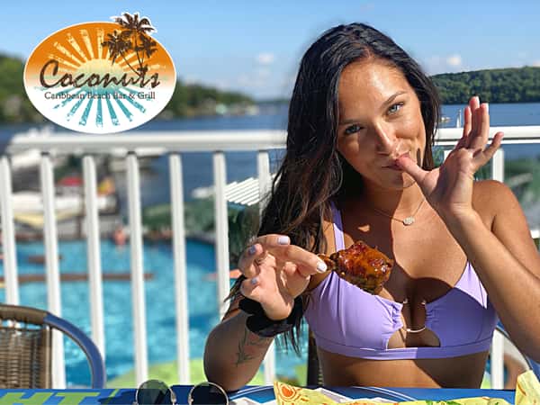 woman eating chicken wing