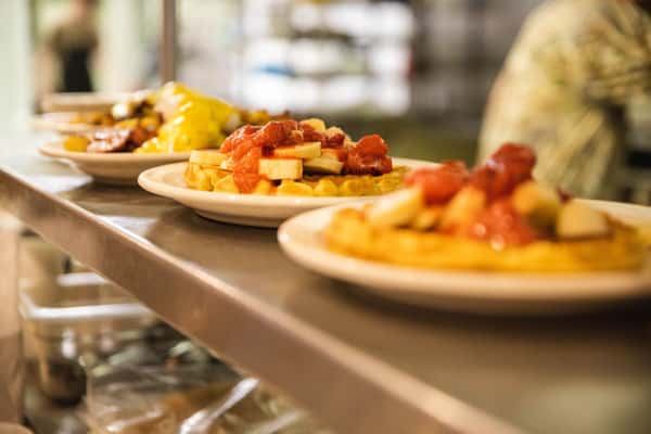 Waffle orders ready up on serving bar