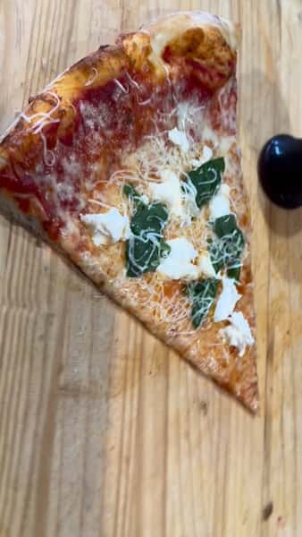 Slice of the day paired with Copa Divino Cabernet spinach ricotta shredded mozzarella
