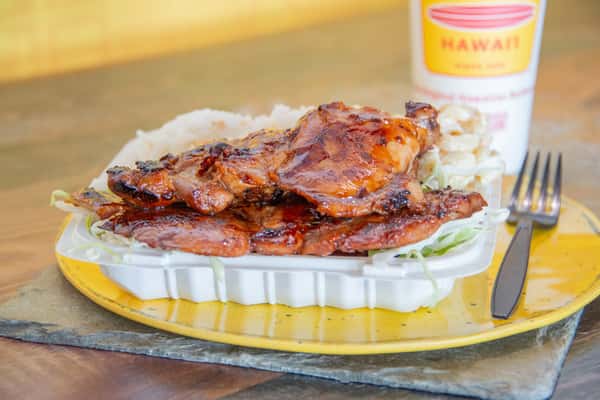 BBQ chicken plate with rice and macaroni salad