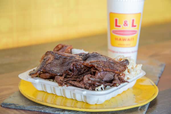 A takeout tray of Hawaiian BBQ short ribs