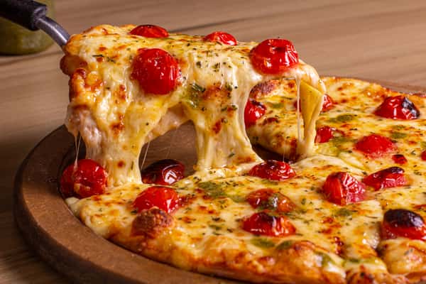 Pizza with cheese and tomato