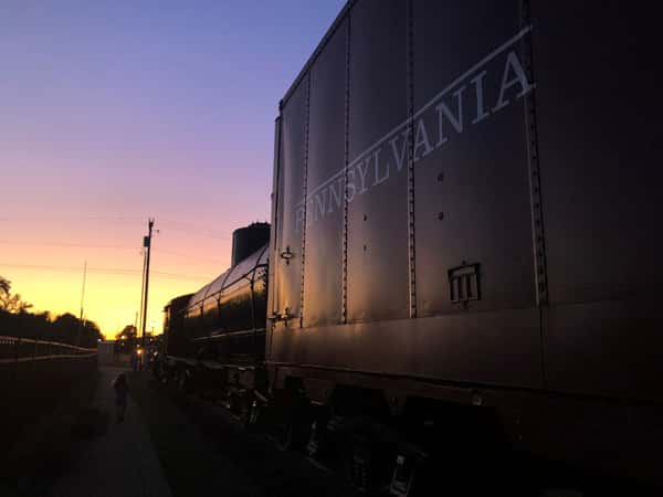 vintage train with view of sunset