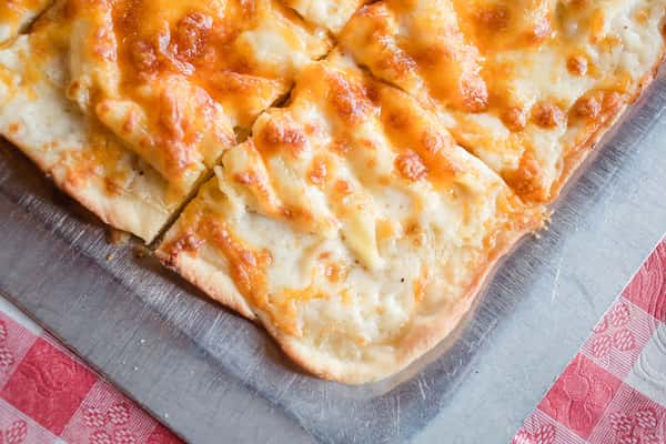 corner of flatbread pizza