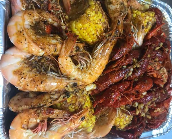 seasoned crab legs, shrimp and corn